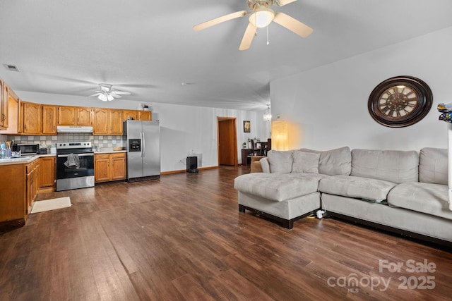306 Forest Ave, Franklin, NC 28734 - living room with a ceiling fan and dark wood-type flooring