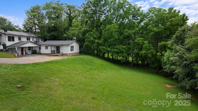 306 Forest Ave, Franklin, NC 28734 - view of green lawn featuring driveway