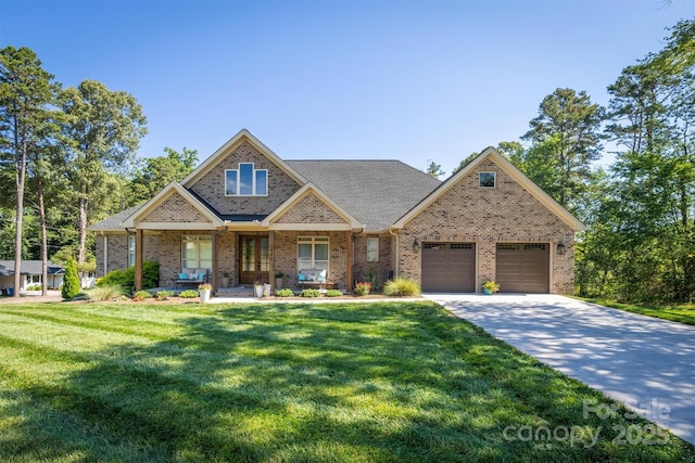 2545 10th Street Ct NE, Hickory, NC 28601 - view of front facade featuring driveway, an attached garage, a front lawn, brick siding, and covered porch