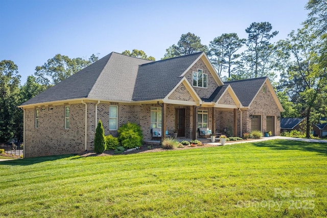 2545 10th Street Ct NE, Hickory, NC 28601 - craftsman-style home featuring a front lawn, a garage, brick siding, and covered porch