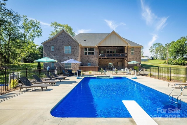 2545 10th Street Ct NE, Hickory, NC 28601 - view of swimming pool featuring a patio area and a diving board