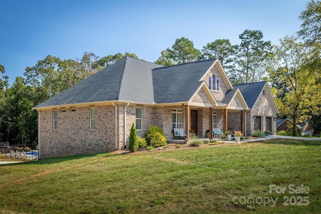 2545 10th Street Ct NE, Hickory, NC 28601 - view of front of home featuring a porch, brick siding, a front lawn, and an attached garage