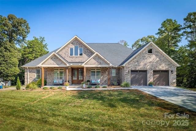 2545 10th Street Ct NE, Hickory, NC 28601 - view of front of property with a front lawn, french doors, concrete driveway, covered porch, and an attached garage