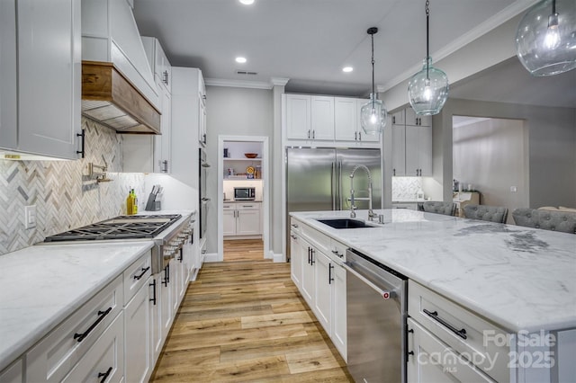 2545 10th Street Ct NE, Hickory, NC 28601 - kitchen featuring stainless steel appliances, crown molding, light wood-type flooring, recessed lighting, and backsplash