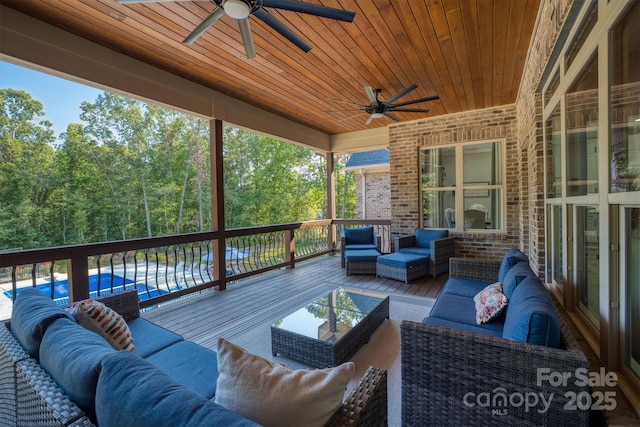 2545 10th Street Ct NE, Hickory, NC 28601 - deck with an outdoor hangout area and a ceiling fan