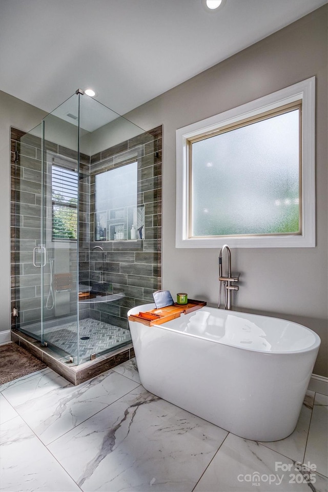 2545 10th Street Ct NE, Hickory, NC 28601 - full bath with marble finish flooring, a stall shower, a freestanding tub, and recessed lighting