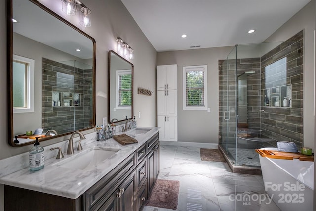 2545 10th Street Ct NE, Hickory, NC 28601 - bathroom with marble finish flooring, healthy amount of natural light, double vanity, a stall shower, and recessed lighting