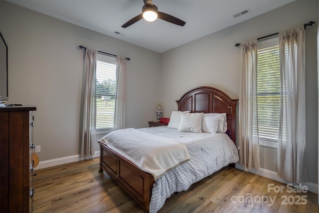 2545 10th Street Ct NE, Hickory, NC 28601 - bedroom with light wood-style flooring and ceiling fan