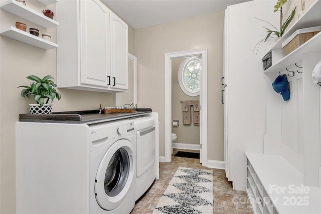 514 Bethel School Rd, Clover, SC 29710 - laundry room featuring washer and dryer and cabinet space