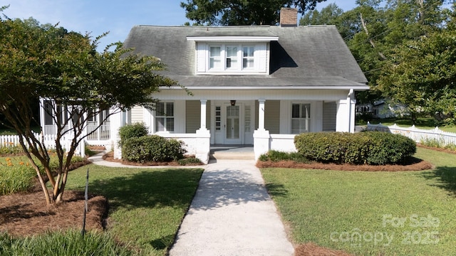 221 Kings Mountain St, Clover, SC 29710 - view of front of home featuring covered porch and a chimney