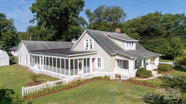221 Kings Mountain St, Clover, SC 29710 - rear view of property with a chimney, a sunroom, and a porch