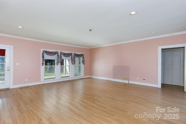 221 Kings Mountain St, Clover, SC 29710 - unfurnished living room with light wood finished floors, crown molding, and recessed lighting