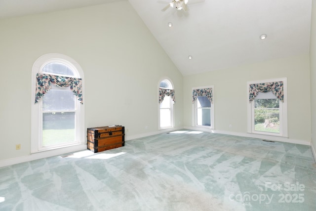 221 Kings Mountain St, Clover, SC 29710 - unfurnished living room with high vaulted ceiling, carpet flooring, plenty of natural light, and a ceiling fan