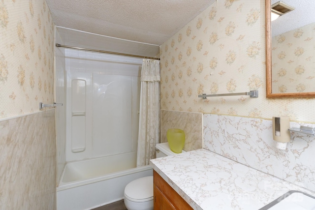 221 Kings Mountain St, Clover, SC 29710 - bathroom featuring wallpapered walls, vanity, a textured ceiling, shower / tub combo, and a wainscoted wall