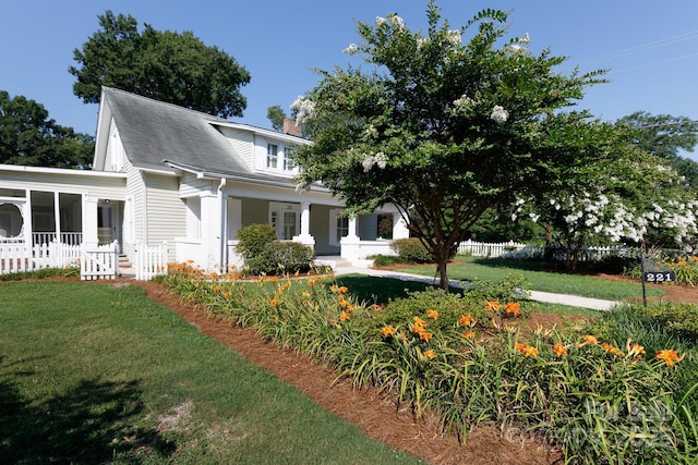 221 Kings Mountain St, Clover, SC 29710 - view of front of home featuring a chimney, a sunroom, and a porch
