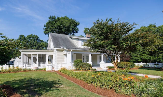 221 Kings Mountain St, Clover, SC 29710 - view of front of property with a sunroom, covered porch, and a chimney