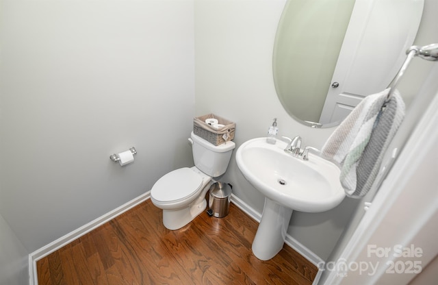 10666 Sapphire Trl, Davidson, NC 28036 - half bath with baseboards and wood finished floors