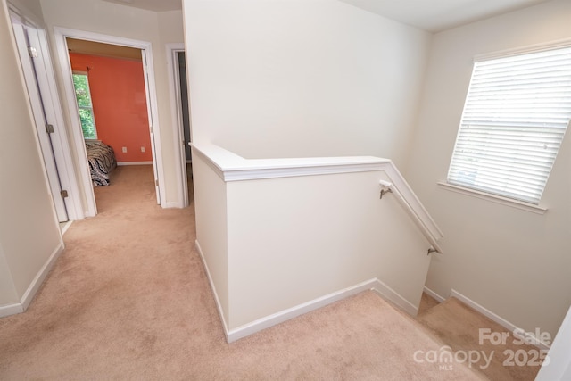 10666 Sapphire Trl, Davidson, NC 28036 - hallway featuring an upstairs landing and light colored carpet