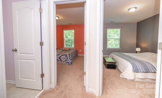 10666 Sapphire Trl, Davidson, NC 28036 - bedroom featuring light colored carpet and baseboards