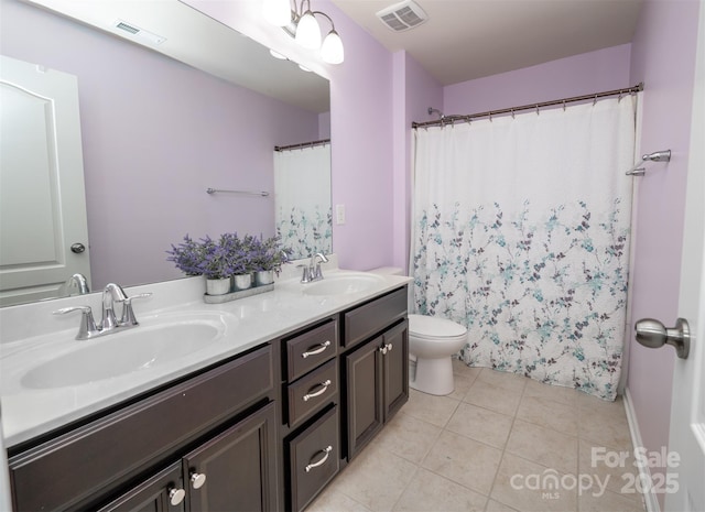 10666 Sapphire Trl, Davidson, NC 28036 - full bathroom with double vanity and tile patterned flooring