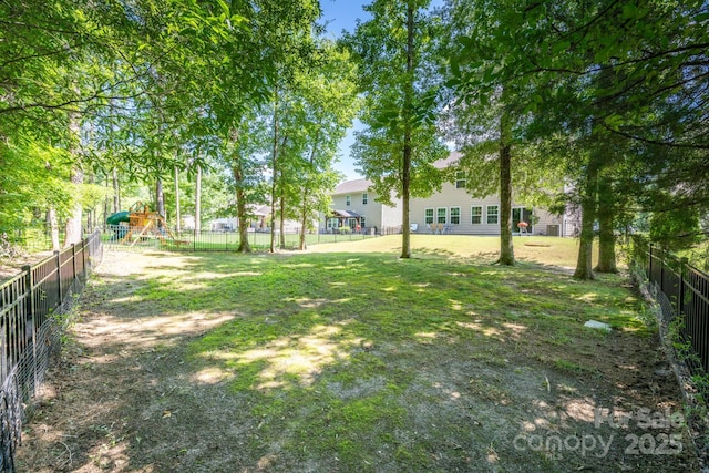 10666 Sapphire Trl, Davidson, NC 28036 - fenced backyard with a playground