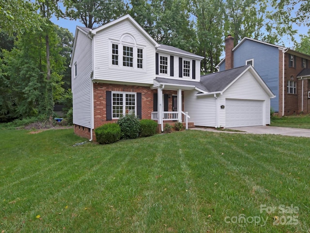 2808 Williams Station Rd, Matthews, NC 28105 - view of front facade with an attached garage, concrete driveway, covered porch, and a front lawn