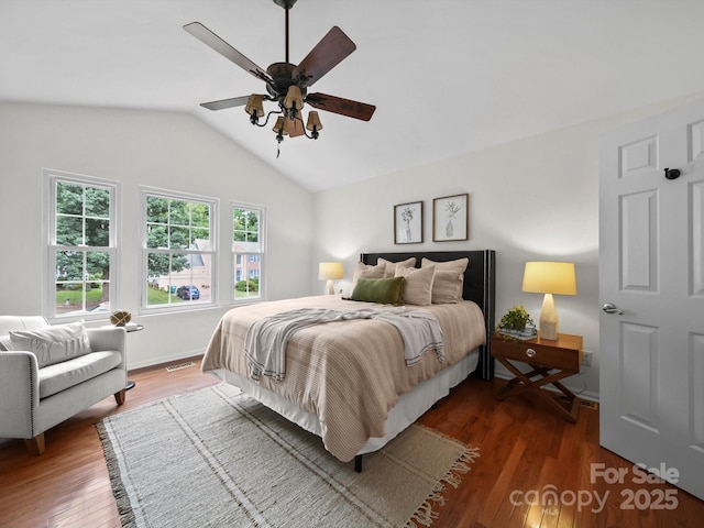 2808 Williams Station Rd, Matthews, NC 28105 - bedroom with dark wood-type flooring, vaulted ceiling, and a ceiling fan