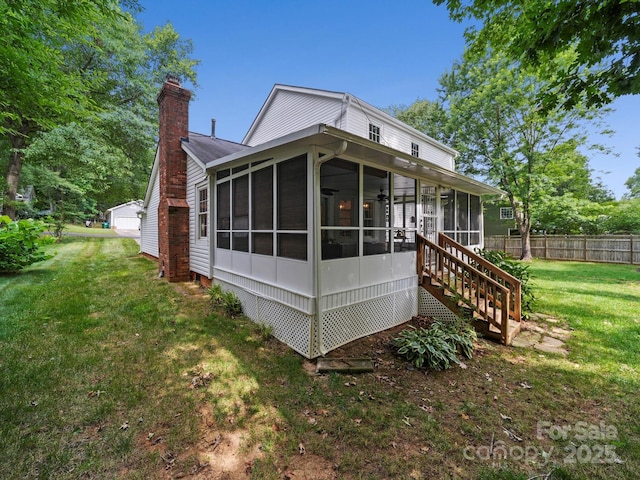 2808 Williams Station Rd, Matthews, NC 28105 - back of property with a sunroom and a chimney