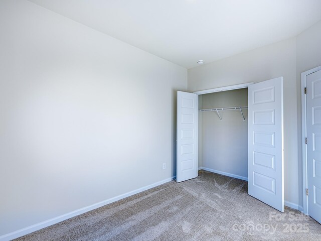 2511 Ruby Dixon Crossing Dr Unit 23, Gastonia, NC 28056 - unfurnished bedroom with light colored carpet and a closet