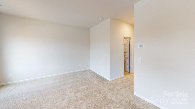 2511 Ruby Dixon Crossing Dr Unit 23, Gastonia, NC 28056 - unfurnished room with light carpet and a smoke detector