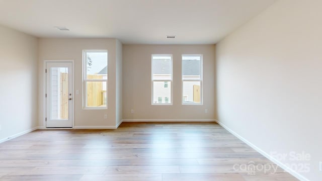 2511 Ruby Dixon Crossing Dr Unit 23, Gastonia, NC 28056 - spare room featuring healthy amount of natural light and light wood finished floors