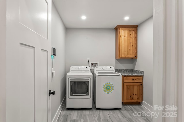 5283 Mount Olive Church Rd, Morganton, NC 28655 - washroom featuring washer and clothes dryer, cabinet space, light wood-type flooring, and recessed lighting