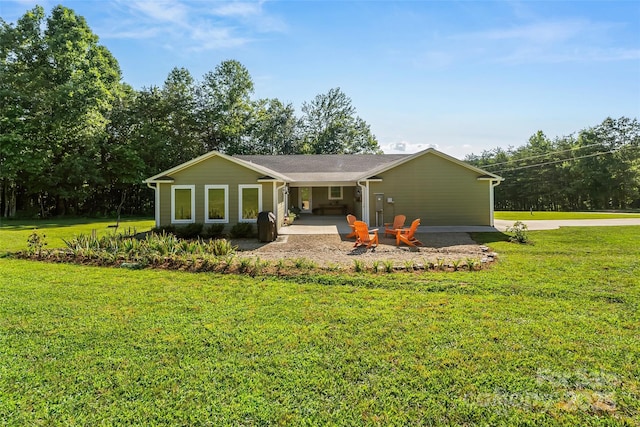 5283 Mount Olive Church Rd, Morganton, NC 28655 - back of house featuring a patio, a yard, and an attached carport