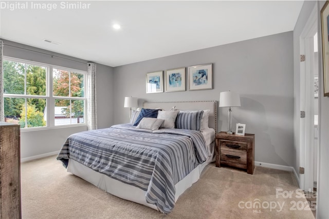 5925 Granbury Dr, Kannapolis, NC 28081 - bedroom featuring carpet floors and multiple windows