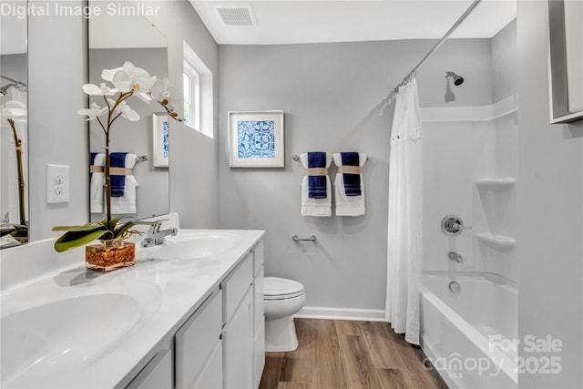 5925 Granbury Dr, Kannapolis, NC 28081 - full bath with shower / bath combo, wood finished floors, and double vanity
