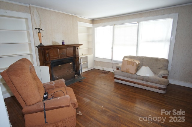 1400 Central Dr, Kannapolis, NC 28083 - living area with wood finished floors, crown molding, built in features, and a fireplace with flush hearth