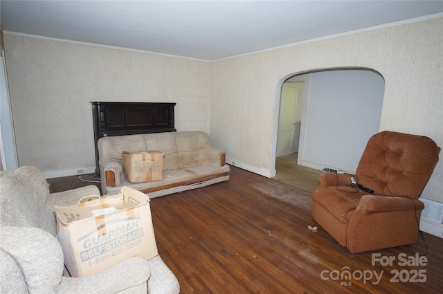 1400 Central Dr, Kannapolis, NC 28083 - living area featuring wood finished floors, arched walkways, and crown molding