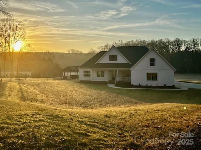 1140 Shinnville Rd, Cleveland, NC 27013 - rear view of house with a yard and a porch