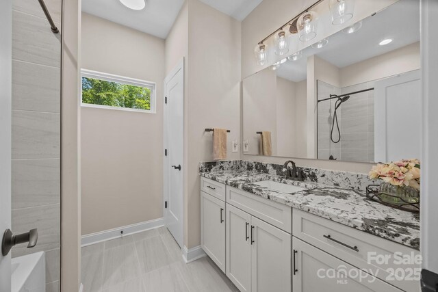 1140 Shinnville Rd, Cleveland, NC 27013 - full bath with vanity and baseboards