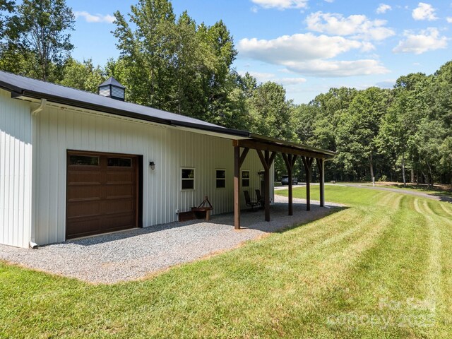 1140 Shinnville Rd, Cleveland, NC 27013 - view of home's exterior with a yard, a chimney, and gravel driveway