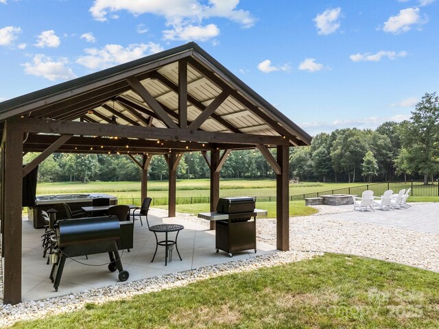 1140 Shinnville Rd, Cleveland, NC 27013 - surrounding community with an outdoor fire pit, a gazebo, and a patio