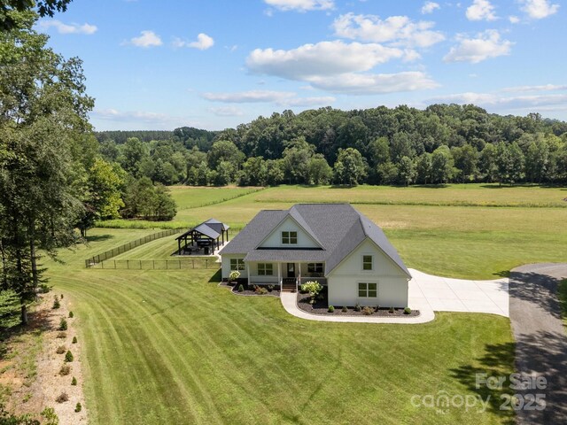 1140 Shinnville Rd, Cleveland, NC 27013 - aerial view of property and surrounding area with a forest