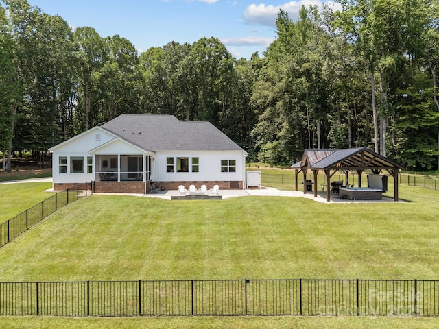 1140 Shinnville Rd, Cleveland, NC 27013 - rear view of property with a gazebo, a sunroom, a patio, and a fenced backyard