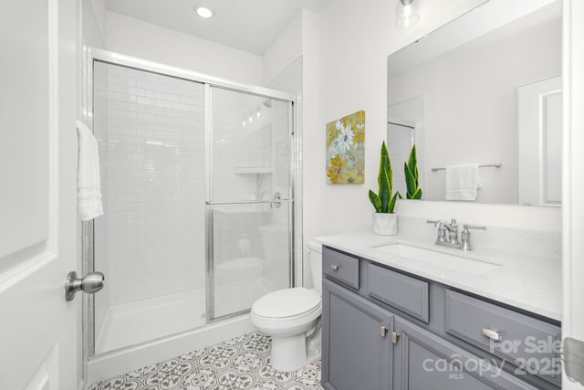 17203 Summers Walk Blvd, Davidson, NC 28036 - bathroom featuring vanity, a shower stall, and tile patterned flooring