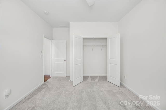 17203 Summers Walk Blvd, Davidson, NC 28036 - unfurnished bedroom featuring carpet flooring and a closet