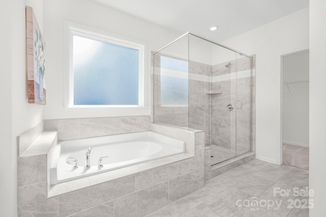 17203 Summers Walk Blvd, Davidson, NC 28036 - bathroom with a garden tub, a shower stall, and a spacious closet