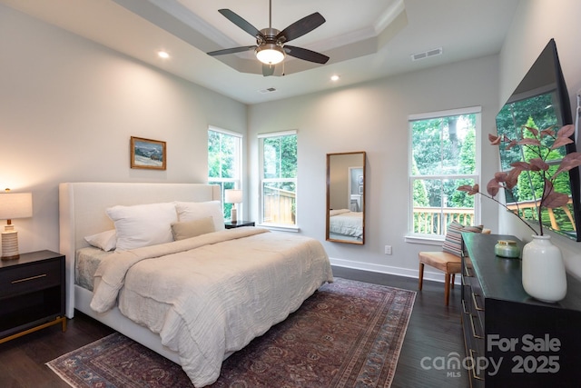 5907 Barrowlands Ct, Charlotte, NC 28210 - bedroom featuring a raised ceiling, dark wood-style flooring, recessed lighting, and a ceiling fan