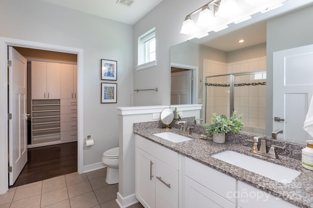 5907 Barrowlands Ct, Charlotte, NC 28210 - full bathroom featuring a stall shower, tile patterned flooring, and double vanity