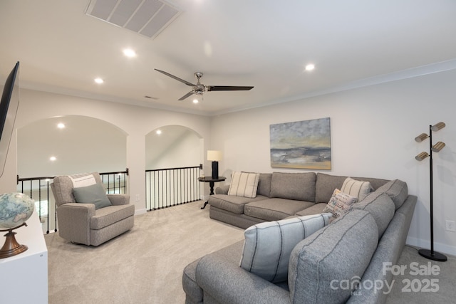 5907 Barrowlands Ct, Charlotte, NC 28210 - living room with light colored carpet, ceiling fan, recessed lighting, and ornamental molding