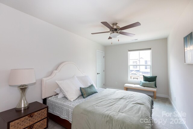 5907 Barrowlands Ct, Charlotte, NC 28210 - bedroom featuring light carpet and a ceiling fan
